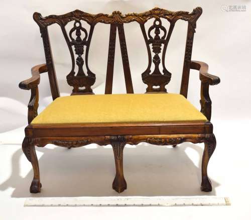 Reproduction carved hardwood miniature two-seater settee in Chippendale style with double chair