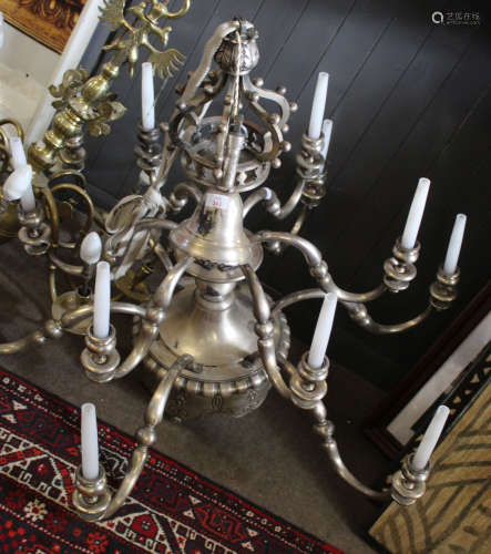 Large reproduction pewter effect modern electrolier in the Dutch manner, fitted with two tiers, each