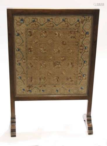 Victorian mahogany framed spark guard on splayed feet with embroidered floral panel, 58cm wide x