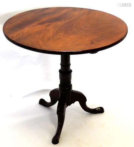 19th century mahogany circular top tilt top table with turned column on a splayed tripod base, top