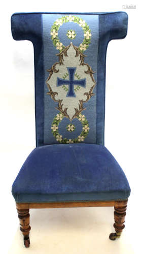 Victorian prie-dieu chair upholstered in blue patterned material, raised on moulded front supports