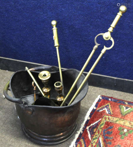 Copper coal helmet containing various brass including shell case, chamber sticks, candle sticks,