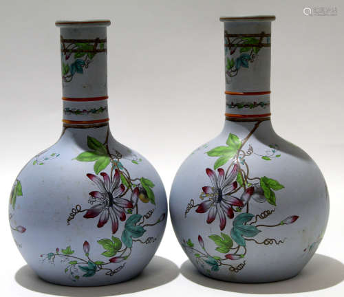 Pair of mid-19th century stoneware vases, the baluster bodies decorated with a painted floral design