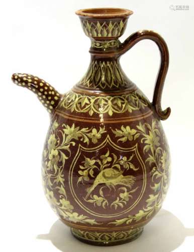 Italian large brown jug with a slip design of birds and foliage, largest 33cm tall