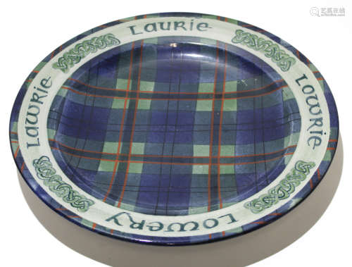 Scottish Tain Pottery charger signed by Alan Powell, with a Laurie or Lowrie tartan design to front,