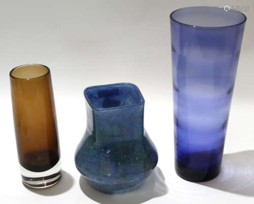 Group of three Art glass vases, one with a swirling blue green design, the other with a brown