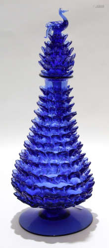 Unusual blue coloured Art glass vase, the baluster body on circular foot with a stepped design in