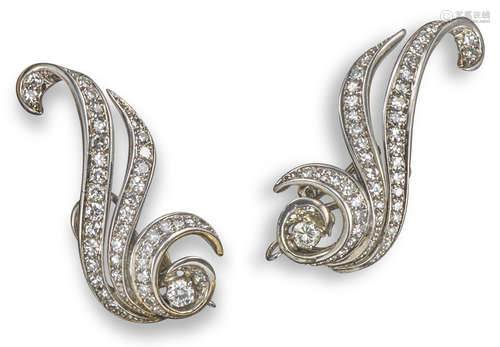 A pair of diamond scroll earrings