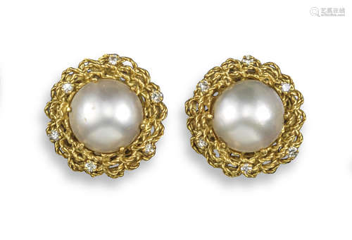 A pair of cultured mabe pearl and diamond bombe earrings