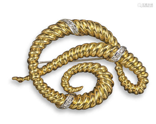 A yellow gold scroll brooch