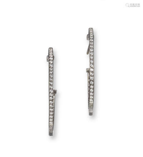 A pair of diamond hoop earrings