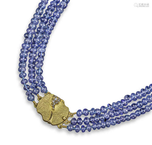 A tanzanite necklace with a gold clasp by Andrew Grima