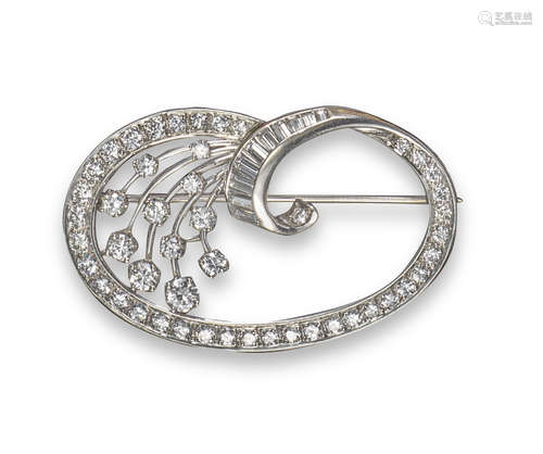 A diamond-set scroll brooch