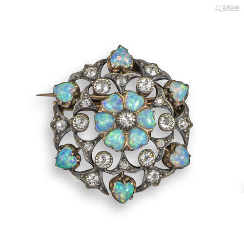 An Edwardian opal and diamond circular brooch pendant