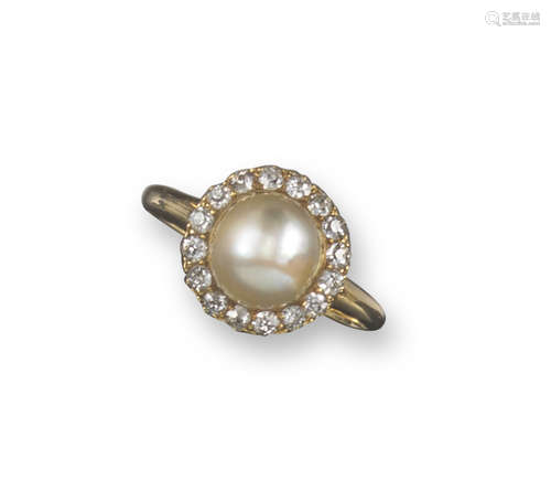 An early 20th century natural pearl and diamond cluster ring