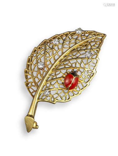 A diamond-set gold leaf brooch by Cartier