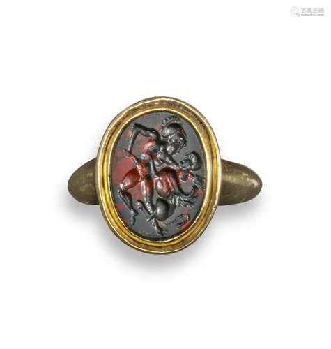 A bloodstone intaglio depicting Hercules