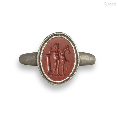 A Roman jasper intaglio ring depicting a Dioscuri