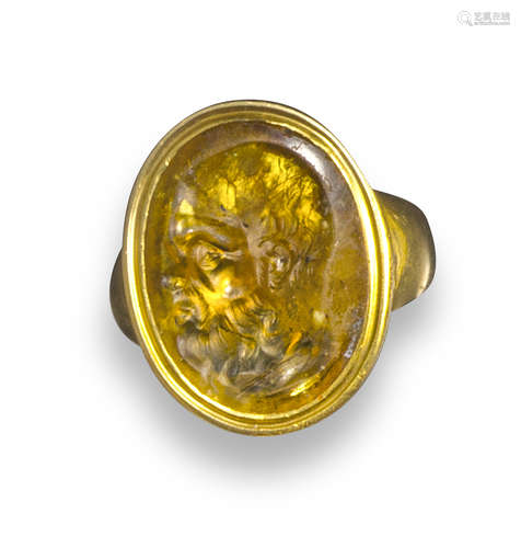 A mid 18th century citrine intaglio depicting Socrates