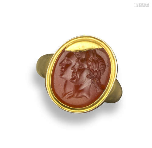 A Julio-Claudian dynasty carnelian intaglio depicting an emperor and his wife