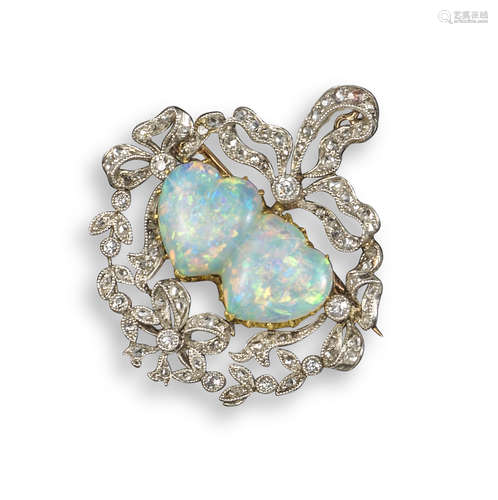 An Edwardian opal and diamond brooch pendant