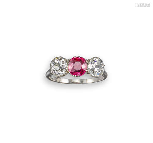 A ruby and diamond three-stone ring