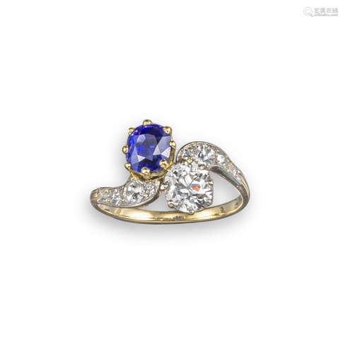 An Edwardian sapphire and diamond crossover ring