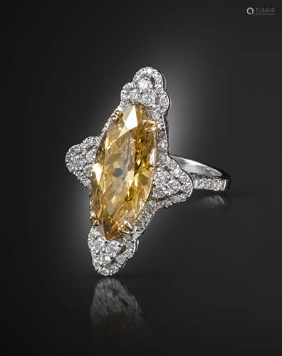 A marquise-shaped fancy-coloured diamond ring