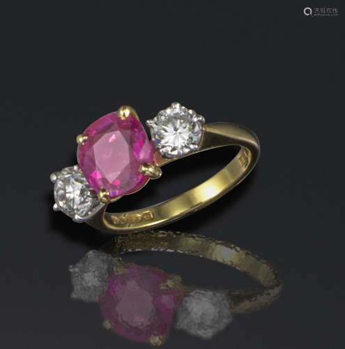 A ruby and diamond three-stone ring
