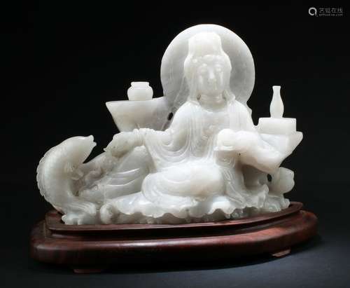 A Large Chinese Jadestone Guanyin Carving with Stand