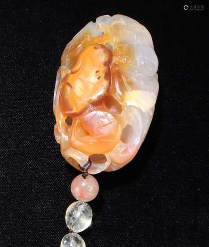 A Chinese Agate Pendant with Beaded String