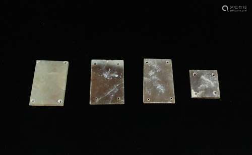 A Group of Four Chinese Jade Plaque, Han Dynasty