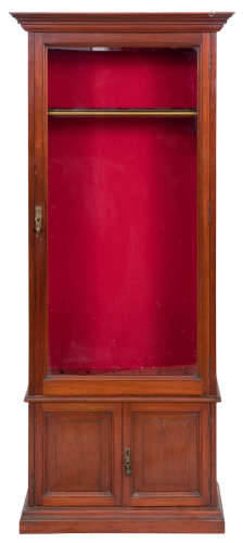 A late Victorian mahogany gun cabinet With ivorine maker label inscribed 'Army and Navy CSL Makers'