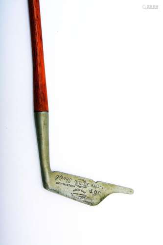 J.P. COCHRANE: AN UNUSUALLY SHAPED METAL HEADED 'UOT' PUTTER, CIRCA 1925