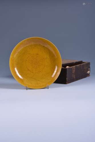 A rare Chinese yellow glazed dish with stylised floral designs