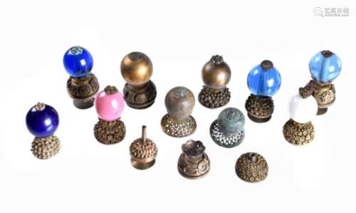 A collection of ten Chinese mandarin hat finials and spare parts