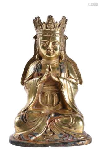 A Chinese gilt-bronze figure of Vairochana