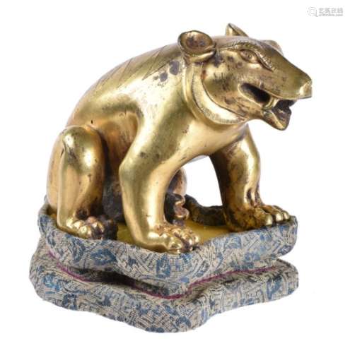 A Chinese gilt bronze figure of a seated bear