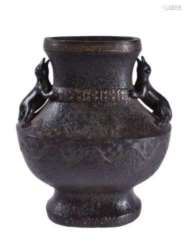 A Chinese gilt cast iron vase