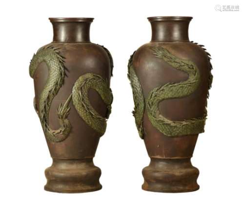 A very large Pair of Japanese Bronze Vases each of inverted baluster form on a stepped base
