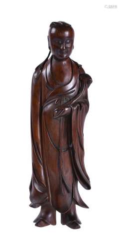 A Chinese carved boxwood figure of a scholar