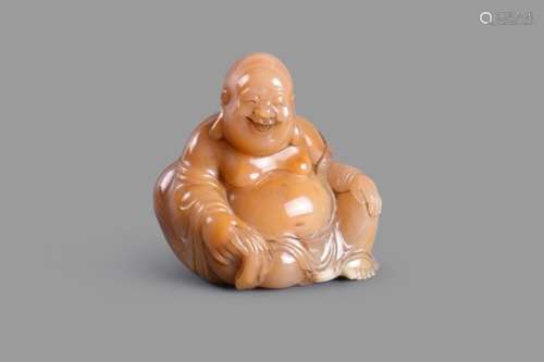 A Chinese soaptone seated Buddha