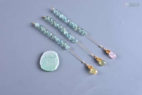 A group of three strings of aquamarine beads for a court necklace