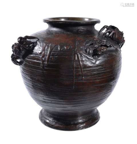 A Japanese Bronze Vase of globular form resting on a splayed foot and with a short neck with everted