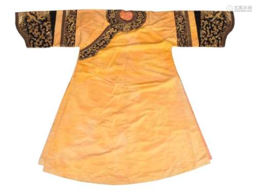 A Chinese golden yellow silk damask informal women's robe