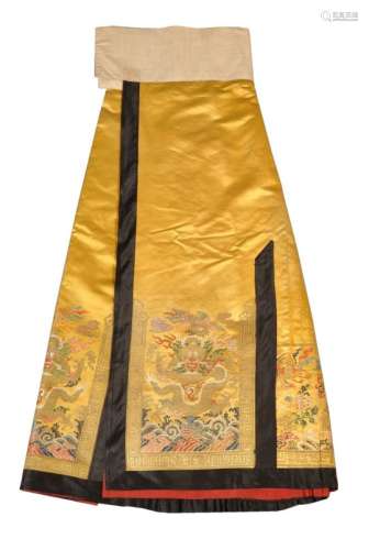 A Chinese yellow brocade pleated skirt