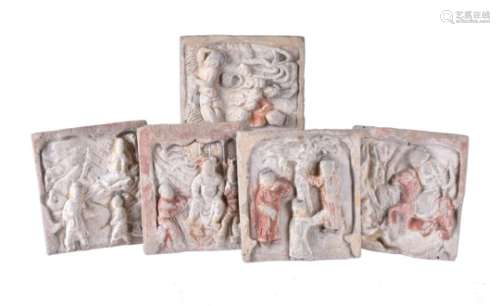 A group of five painted pottery figural tiles