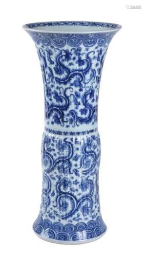 A large Chinese blue and white beaker vase