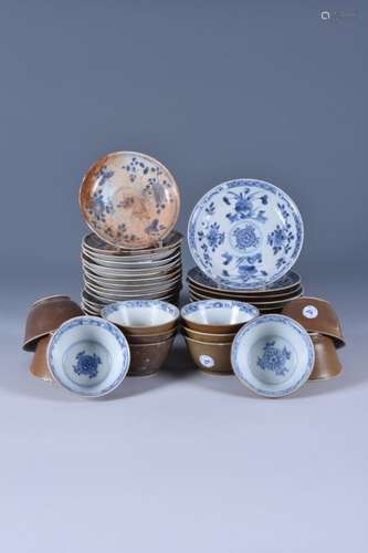 Twelve Ca Mau 'lotus and flowerhead' pattern blue and white teabowls and nine saucers