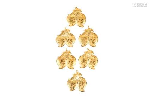 SIX CHINESE GOLD DOUBLE PEACH PENDANTS